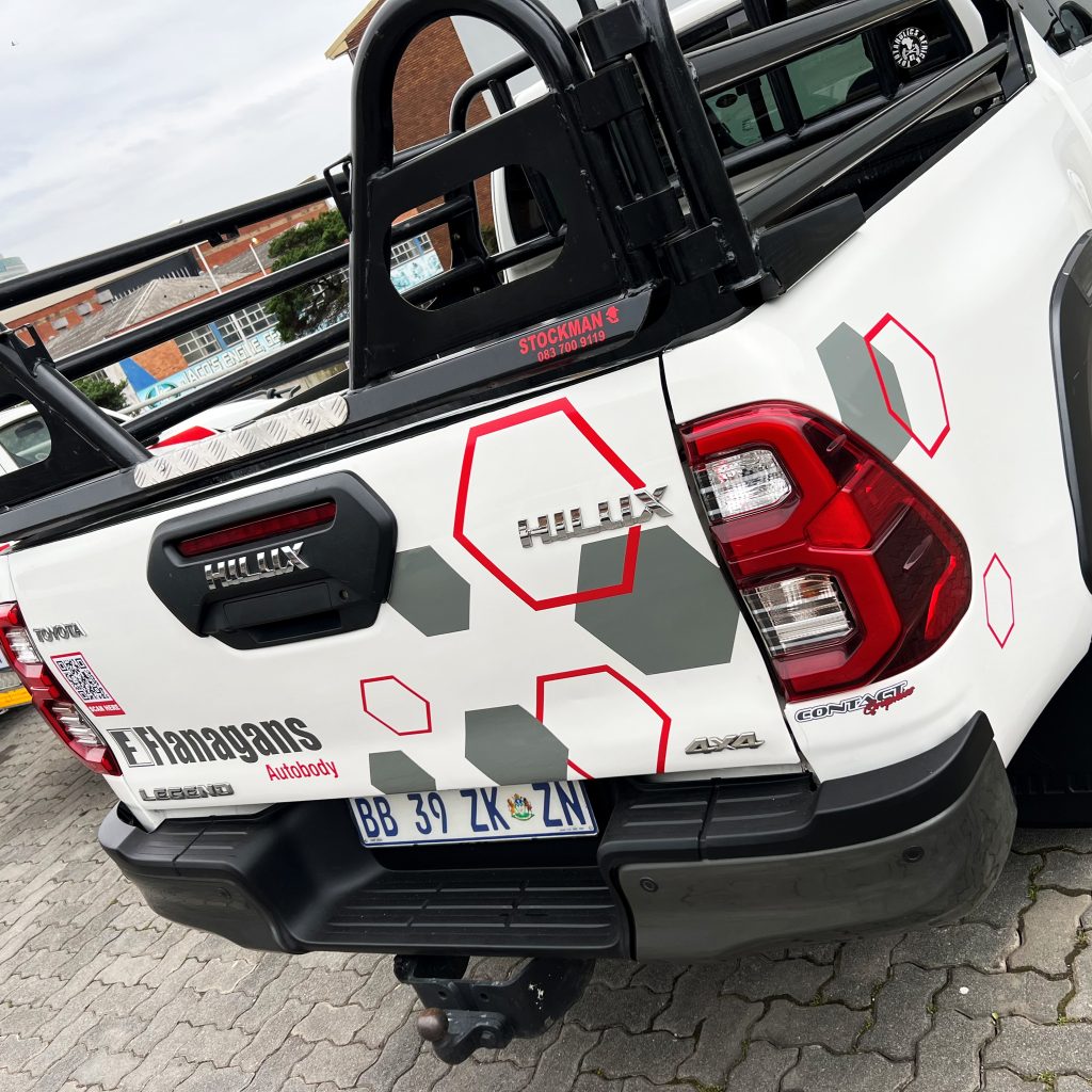 contact graphics bakkie toyota hilux decals wrap branding flanagans autobody vehicle durban south africa